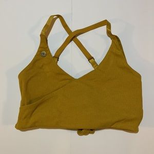 Love Fitness yellow sports bra. Cross front, tie back, adjustable straps